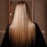 Long glossy blonde hair after treatment