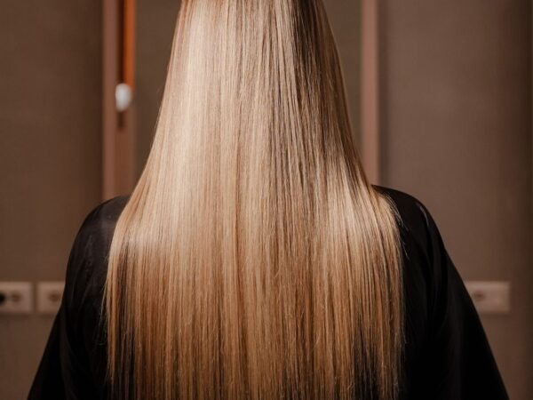 Long glossy blonde hair after treatment