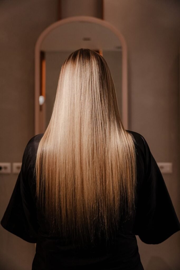 Long glossy blonde hair after treatment