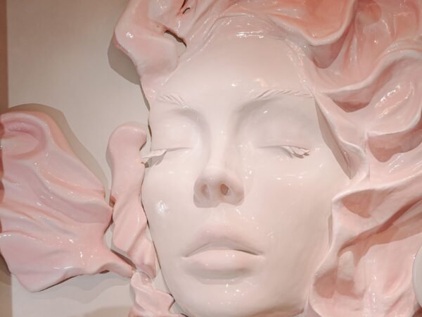 Q Centre salon, signature sculpture wall