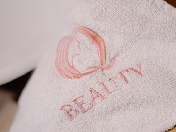 Q Beauty branded towel
